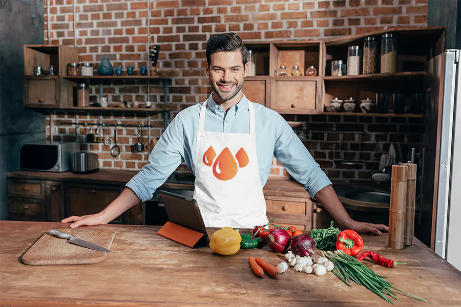 apron-mockup-of-a-happy-man-in-the-kitchen-m2855-r-el2_1_