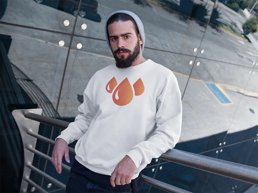 man-wearing-a-crewneck-sweatshirt-template-while-on-the-outside-of-a-building-a17761