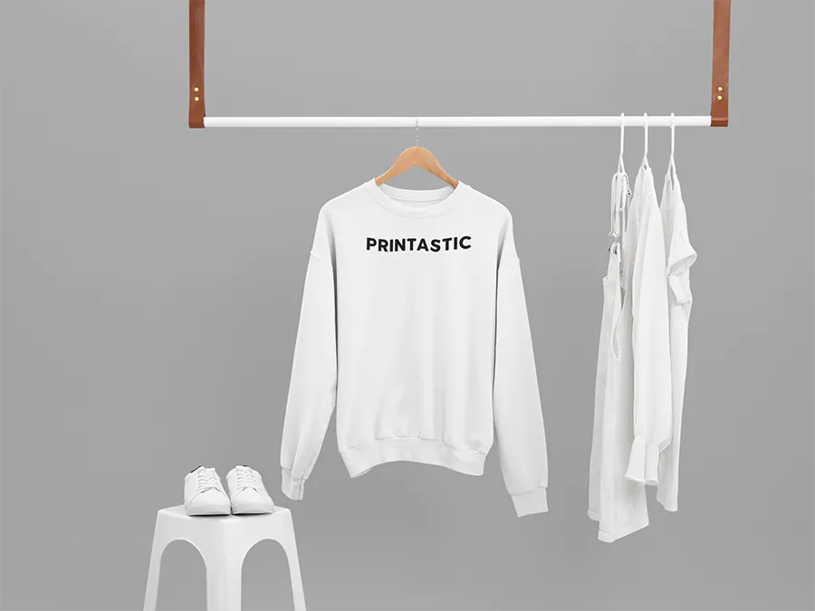 mockup-of-a-sweatshirt-hanging-with-only-white-clothes-26892